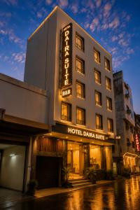 a hotel building with a sign that reads hotel danza suite at Hotel Daira Suite Near IGI Airport Delhi in New Delhi