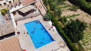 an overhead view of a swimming pool with people in it at HS Olivos in Alcalá del Júcar +35 photos
