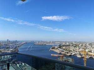 a view of a river from the top of a building at Elegant Sea View Apartment in Ajman 