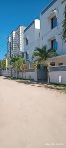 an empty street in front of a building at Kanaprime Hotels & Safaris Shanzu pride in Mombasa