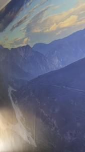 a view of a mountain range from an airplane at Pachamama House in Bucaramanga