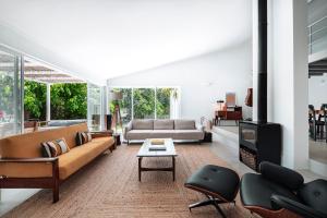 a living room with a couch and a fireplace at Quinta da Berlica - Alentejo in Estremoz