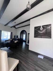 a living room with a couch and a table at Casa Bolta Rece in Sighetu Marmaţiei