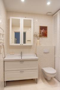 a bathroom with a sink and a toilet at Anties Namai in Juodkrantė +17 photos