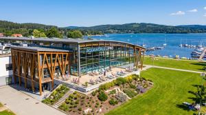an aerial view of a building with a park at Relax in Korzo Lipno in Lipno nad Vltavou