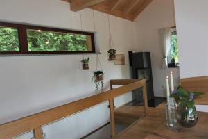 a living room with a table and a window at Danuvius18 in Obernzell +18 photos