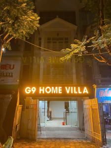 a building with a sign that says go home villa at G9 home hotel in Hanoi