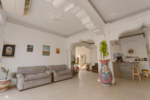 a large living room with two couches and a table at Home Hotel Dahab in Dahab