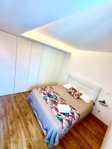 a bedroom with a bed in a room at Loft City Center Viana in Viana do Castelo