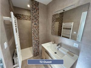 a bathroom with a sink and a mirror at L'Arc en Ciel in Gréoux-les-Bains +22 photos