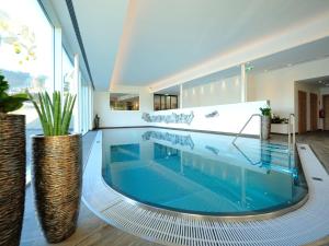 Πισίνα στο ή κοντά στο Hotel Röck Garni