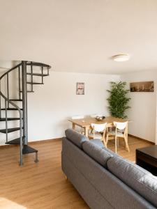 a living room with a couch and a table at Casa do Carballo in Nigrán