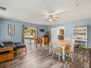 a living room with a table and a couch at Meadowlark Retreat in Ahwahnee