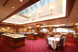 HOTEL MYSTAYS Sapporo Aspen tesisinde bir restoran veya yemek mekanı