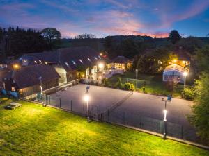 an image of a courtyard at night with lights at 9 Bed in Alkham oc-m34784 in Swingfield