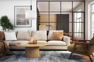 a living room with a couch and a table at Le Ponsardin in Reims