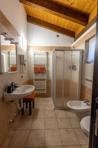 a bathroom with two sinks and a shower at La Madrugada in Malcesine +122 photos