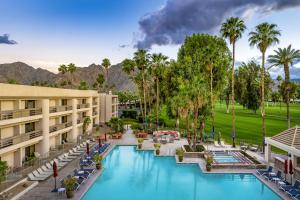 an aerial view of a hotel with a pool and palm trees at Indian Wells Resort Hotel in Indian Wells