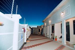 a hallway of a building with white walls at Dodoma Haven Homes in Dodoma