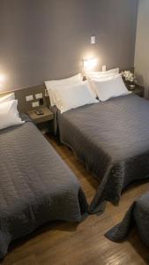 a hotel room with two beds in a room at Nohotel Nova Odessa in Nova Odessa +58 photos