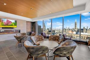 a living room with a view of the city at Executive Condo with Parking DT Ottawa in Ottawa