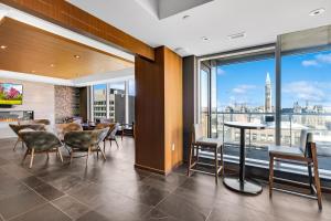 a dining room with a view of the city at Executive Condo with Parking DT Ottawa in Ottawa