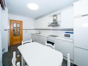 Kuchyňa alebo kuchynka v ubytovaní Gestión de Alojamientos Apartments