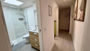 a bathroom with a shower and a toilet and a sink at San Miguel Centro in Torremolinos +24 photos