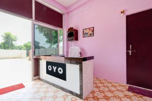 a room with aiya sign on a counter in front of a door at SPOT ON S.S HOTEL in Lucknow