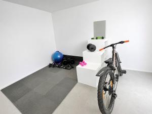 a bike parked in a room with white walls at Joselia in Falkenberg
