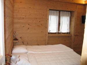 Postel nebo postele na pokoji v ubytování B & B Le Riue