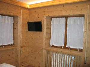 TV a/nebo společenská místnost v ubytování B & B Le Riue