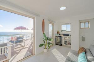 a living room with a view of the ocean at Seacrest 9 in Gold Coast