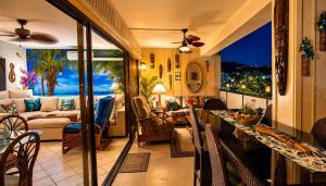 a living room with a view of a living room at Kona Plaza#409 in Kailua-Kona