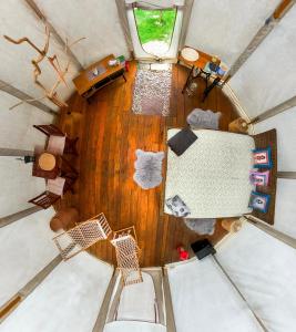 an overhead view of a living room in a tiny house at glamping podtrosky in Troskovice