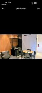 a room with a table and chairs and a kitchen at Gave risort Porto life 2 in Porto De Galinhas