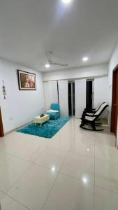 a living room with a couch and a chair at Casa lujosa lorica in Lorica