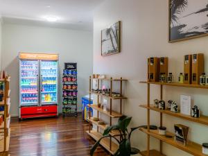 a store with a soda machine in a room at NRMA Angourie Resort, Yamba in Yamba