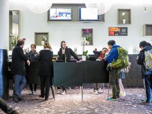 a group of people standing around a table at ibis Styles Albertville in Albertville
