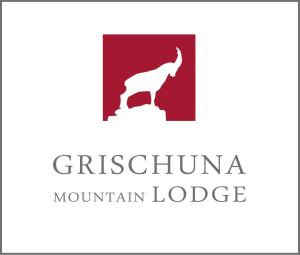 ein Logo für eine Berghütte mit einer Ziege oben in der Unterkunft Grischuna Mountain Lodge in Samnaun