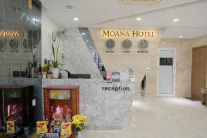 a lobby of a moma hotel with a reception at Moana Hotel Nha Trang in Nha Trang