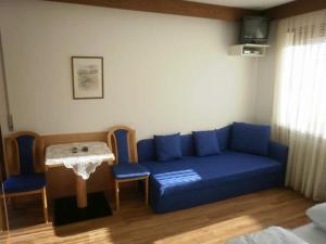 A seating area at Pension Tannenhof