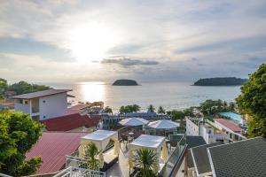 a view of the ocean from a resort at Anthiya Seaview Villa Hotel Phuket in Kata Beach