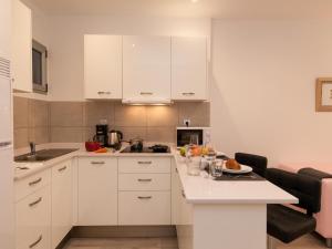 Kuchyňa alebo kuchynka v ubytovaní Apartments Las Canteras Beach LM3