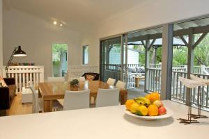 a bowl of fruit on a table in a living room at Edgewater on Quindalup Beachfront in Quindalup