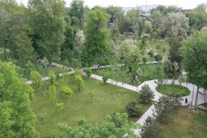 an overhead view of a park with trees and a path at Horev Medical Center in Tashkent