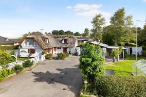 an aerial view of a house with a driveway at New Renovated Farmhouse in Slagelse