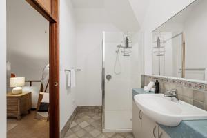 a bathroom with a sink and a shower at Sidney Laine - Family Friendly - Private in Margaret River Town +24 photos