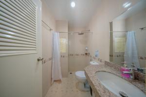 a bathroom with a sink and a toilet and a shower at Nan's Aonang in Ao Nang  +74 photos