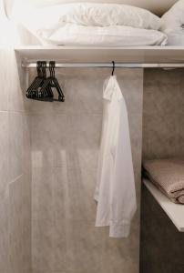a bedroom with a bed on top of a wall at Casa Centro Kilkis in Kilkis
